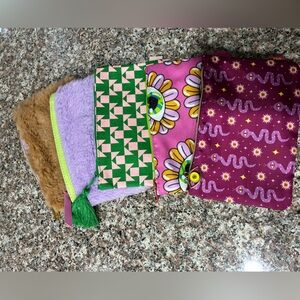 Five Ipsy Travel/Make Up Bags

Brown & Purple Fluffy,Green/Pink,Eyes,Snake Eyes